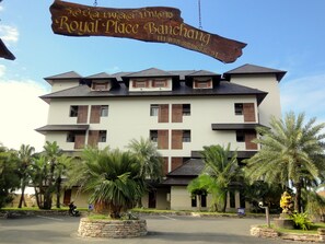 A multi-story building with a sign reading "Royal Place Banchang" and a contact number. - Royal Place Banchang (Ban Chang)