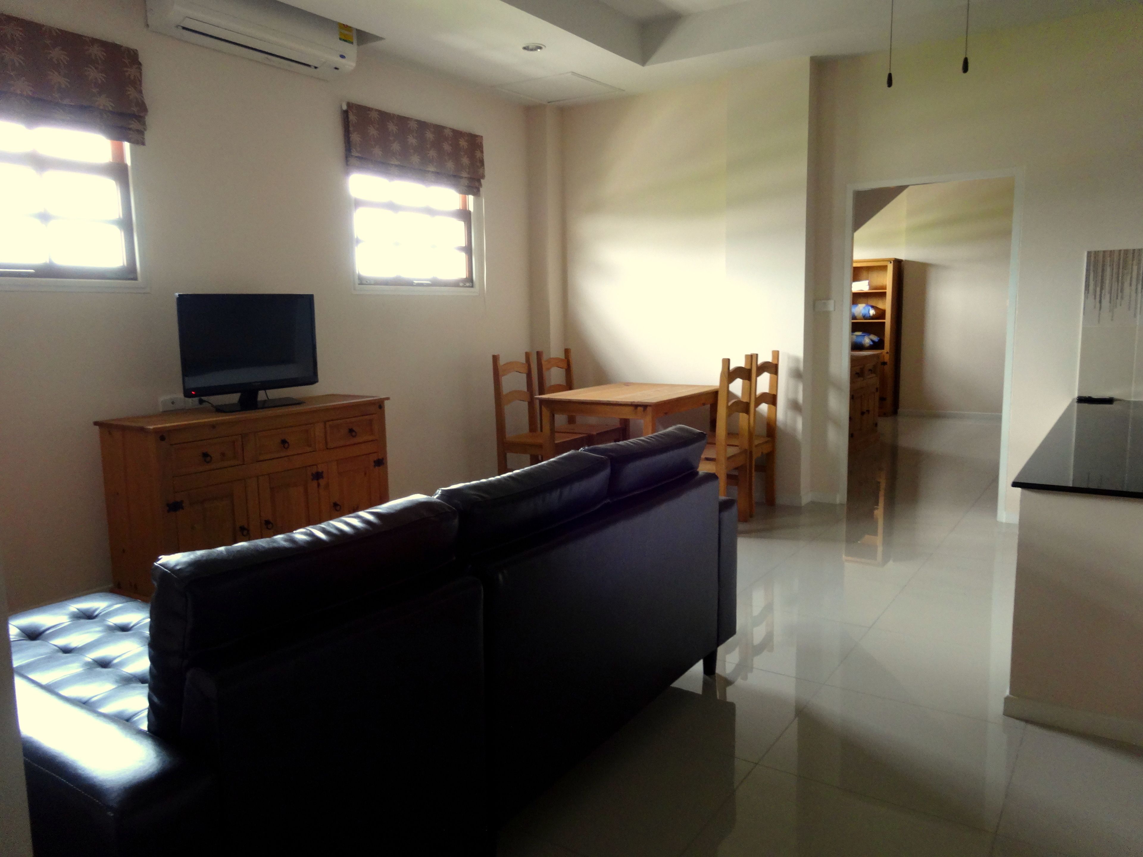 senior plan house suite | living room | 34-inch flat-screen tv with cable channels, tv