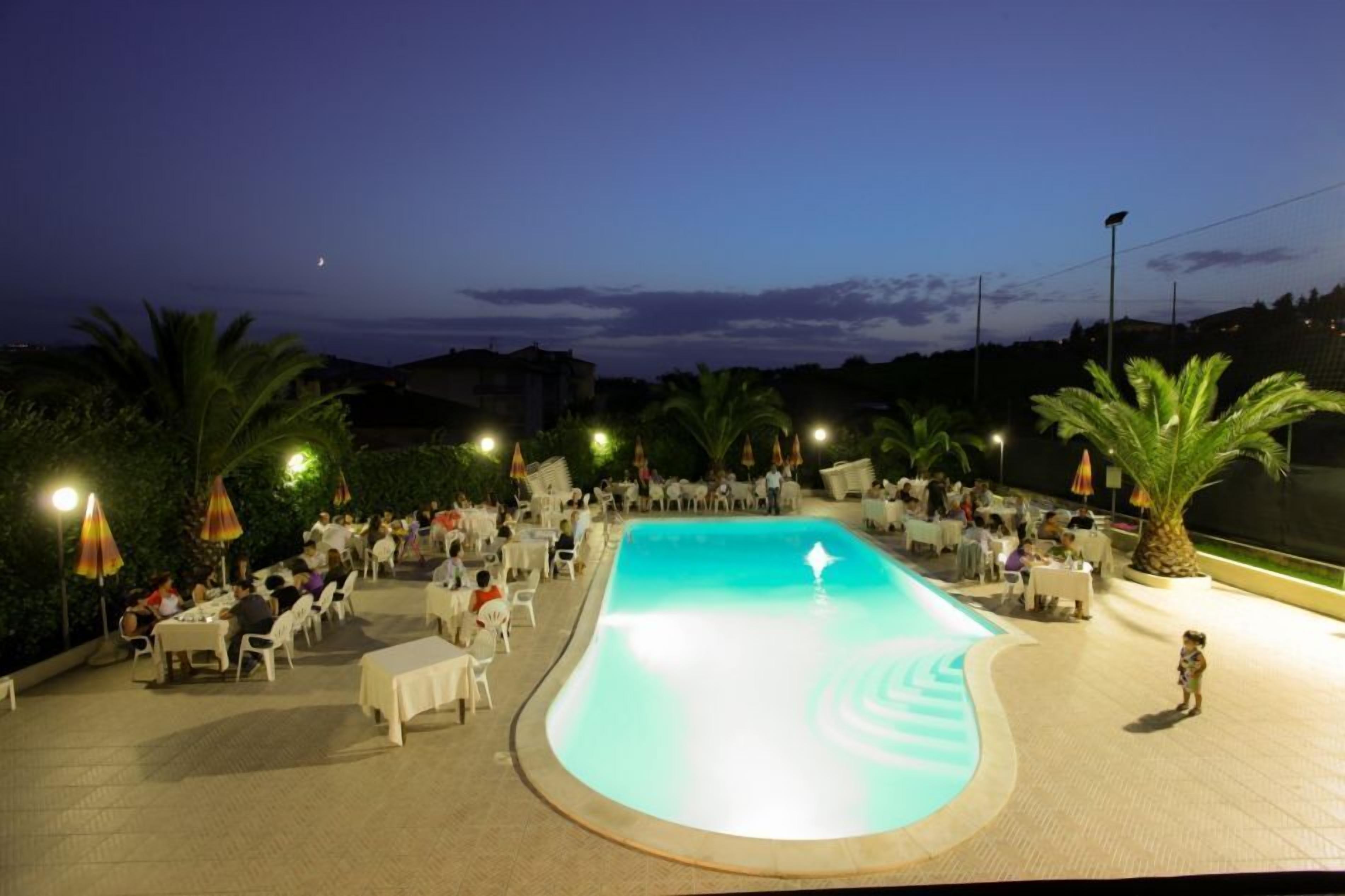 seasonal outdoor pool, pool umbrellas, pool loungers