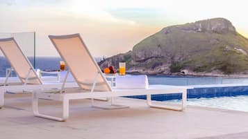 Outdoor pool, open 8:00 AM to 8:00 PM, pool umbrellas, sun loungers