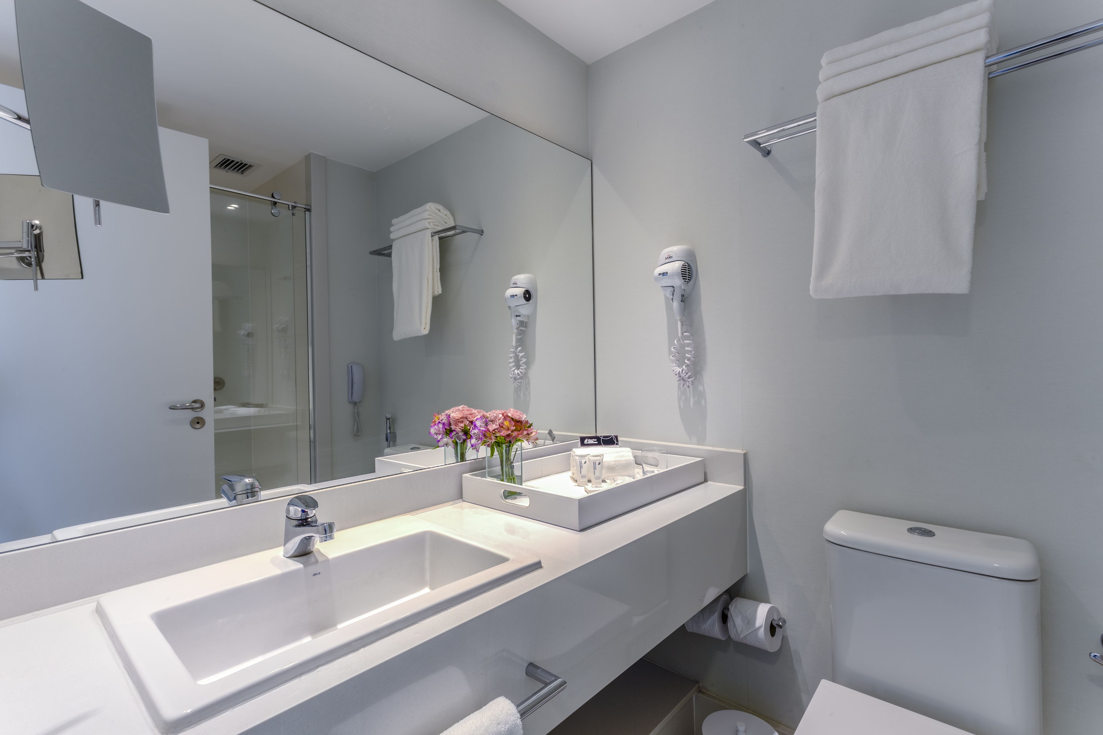 shower, free toiletries, hair dryer, towels