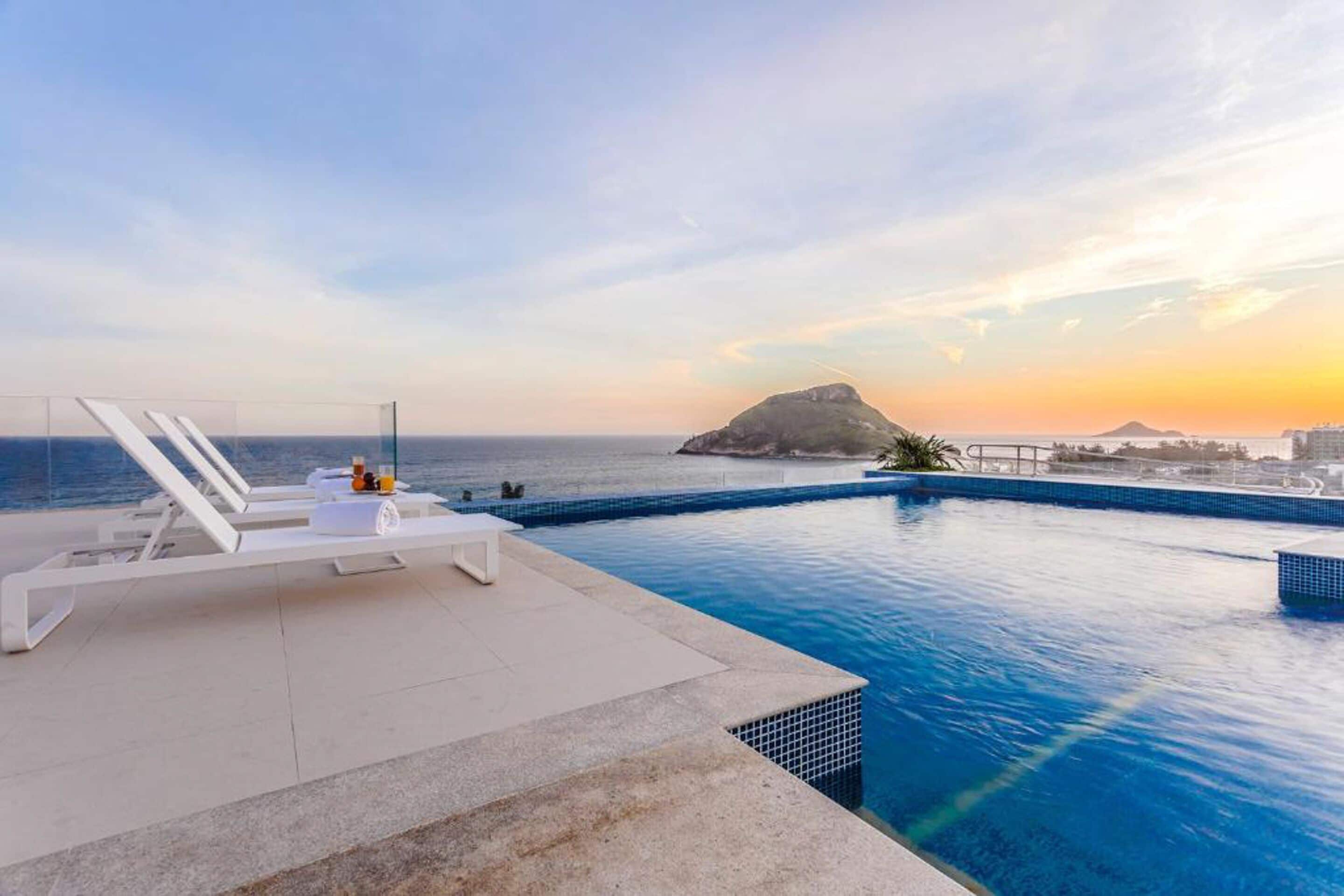 outdoor pool, open 8:00 am to 8:00 pm, pool umbrellas, pool loungers