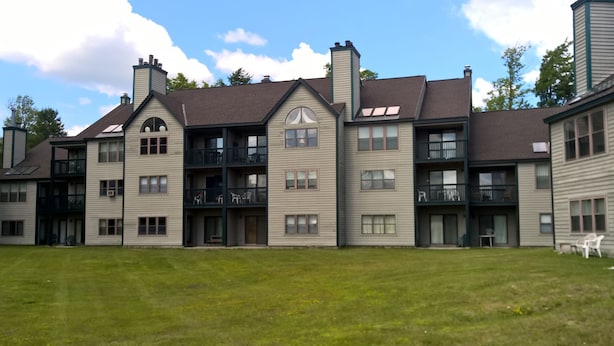 A multi-story residential building with a central courtyard. - Winterplace at Okemo, A Vail Resorts Property (Ludlow)