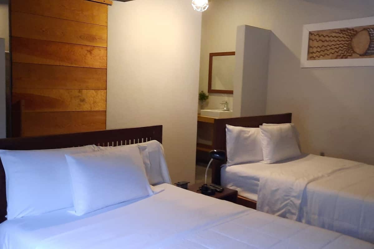 standard quadruple room, 2 double beds | free cots/infant beds, free wifi, bed sheets