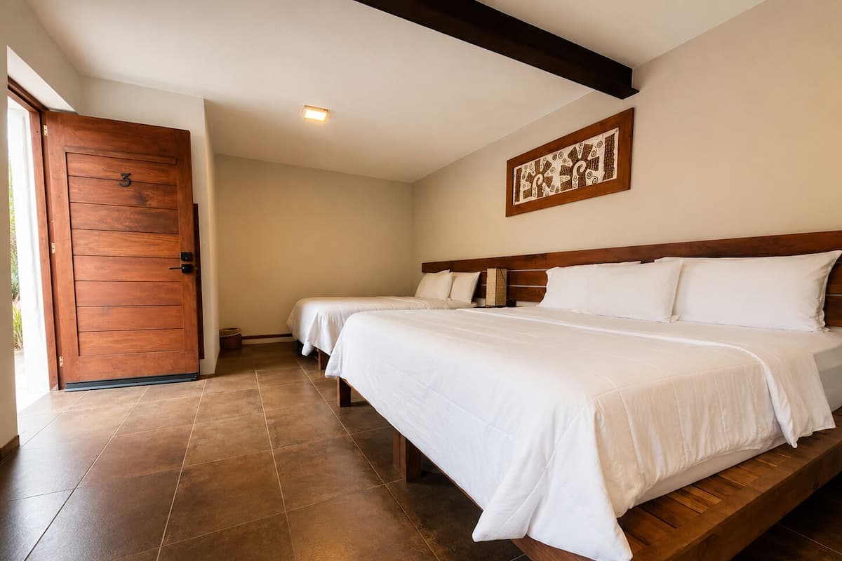 Habitació estàndard, 2 llits de matrimoni | Wifi gratuïta i roba de llit 