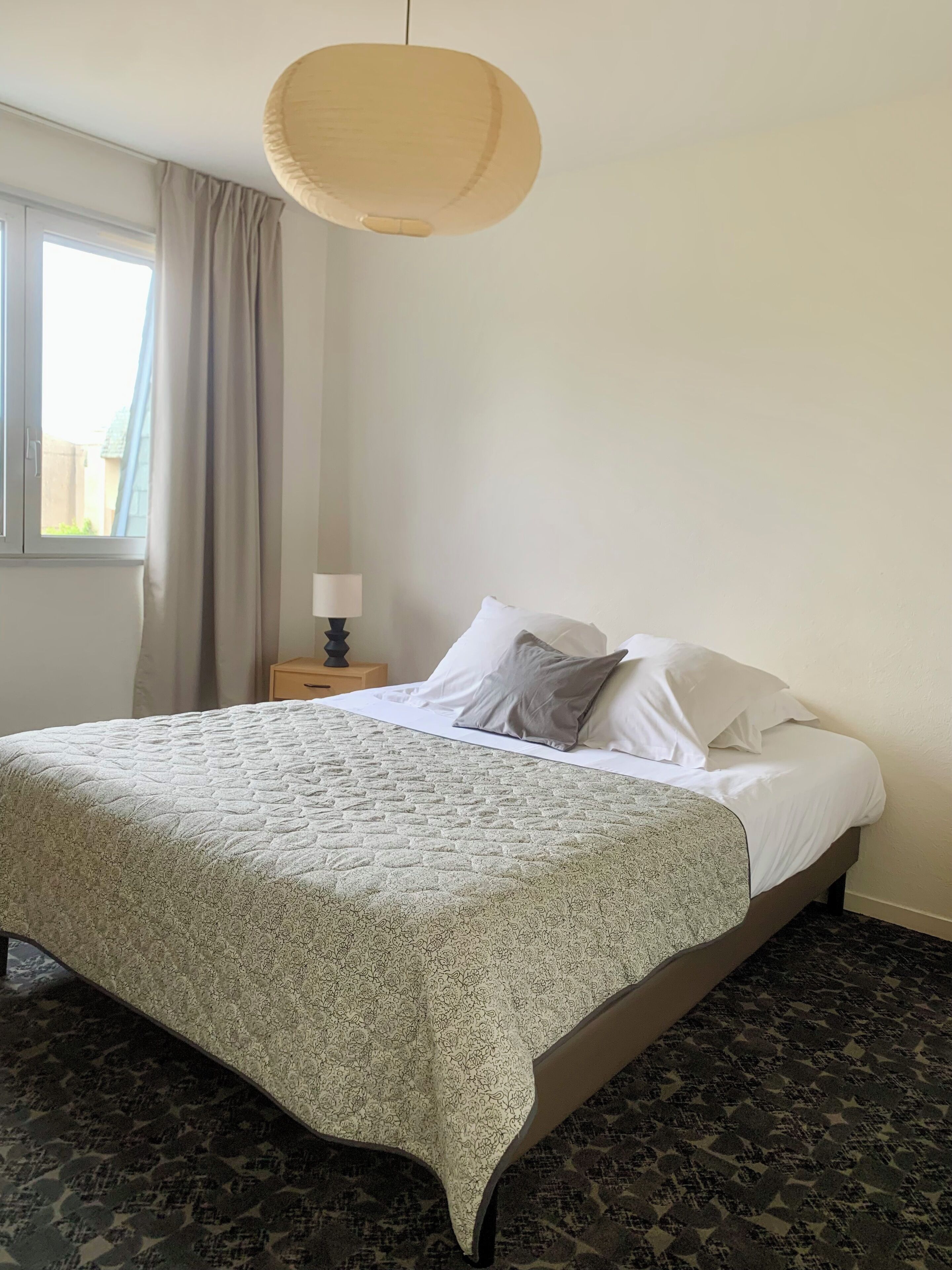 Premium bedding, desk, blackout curtains, soundproofing
