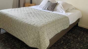 Premium bedding, desk, blackout curtains, soundproofing