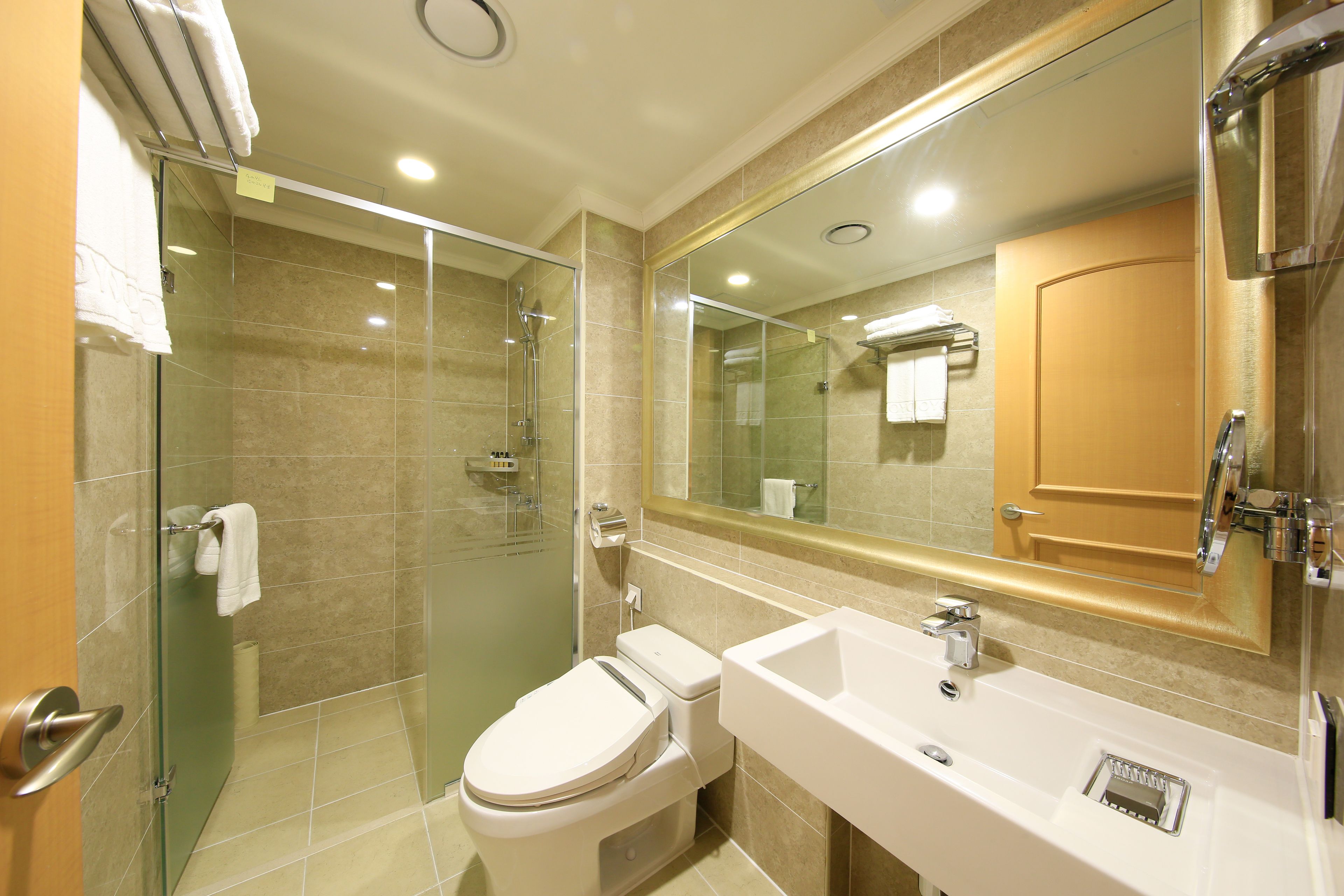 standard twin room (hotel) | bathroom | hair dryer, bathrobes, slippers, bidet