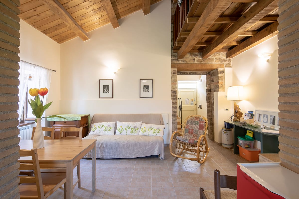 Family Apartment, 4 Bedrooms | Living area | Flat-screen TV