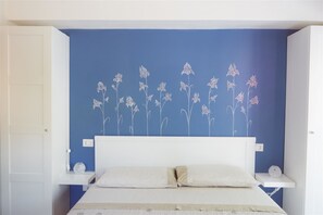Familienstudio, Mehrere Betten, Küche, Gartenblick | Italienische Bettbezüge von Frette, hochwertige Bettwaren