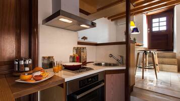 Apartment, Balcony | Private kitchen | Fridge, stovetop, dishwasher, espresso maker