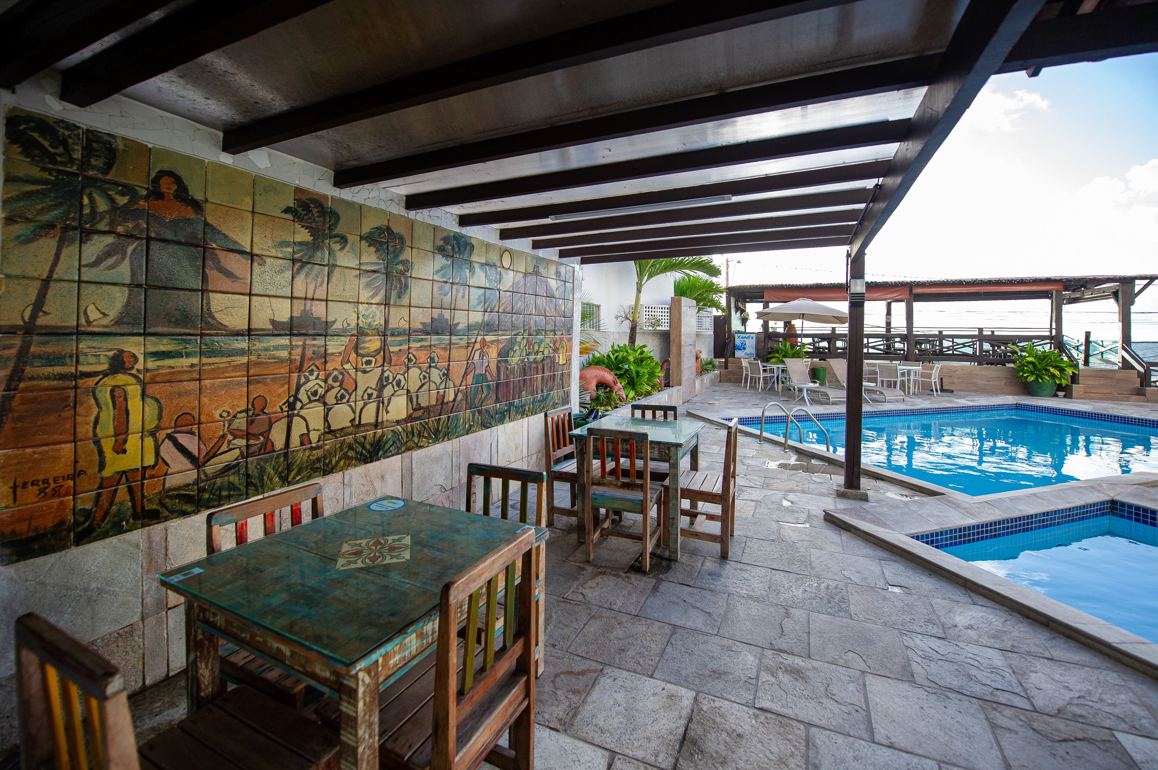 2 outdoor pools, open 10:30 am to 7:00 pm, pool umbrellas, pool loungers