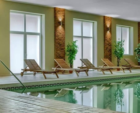 Indoor pool, open 8:00 AM to 8:00 PM, sun loungers