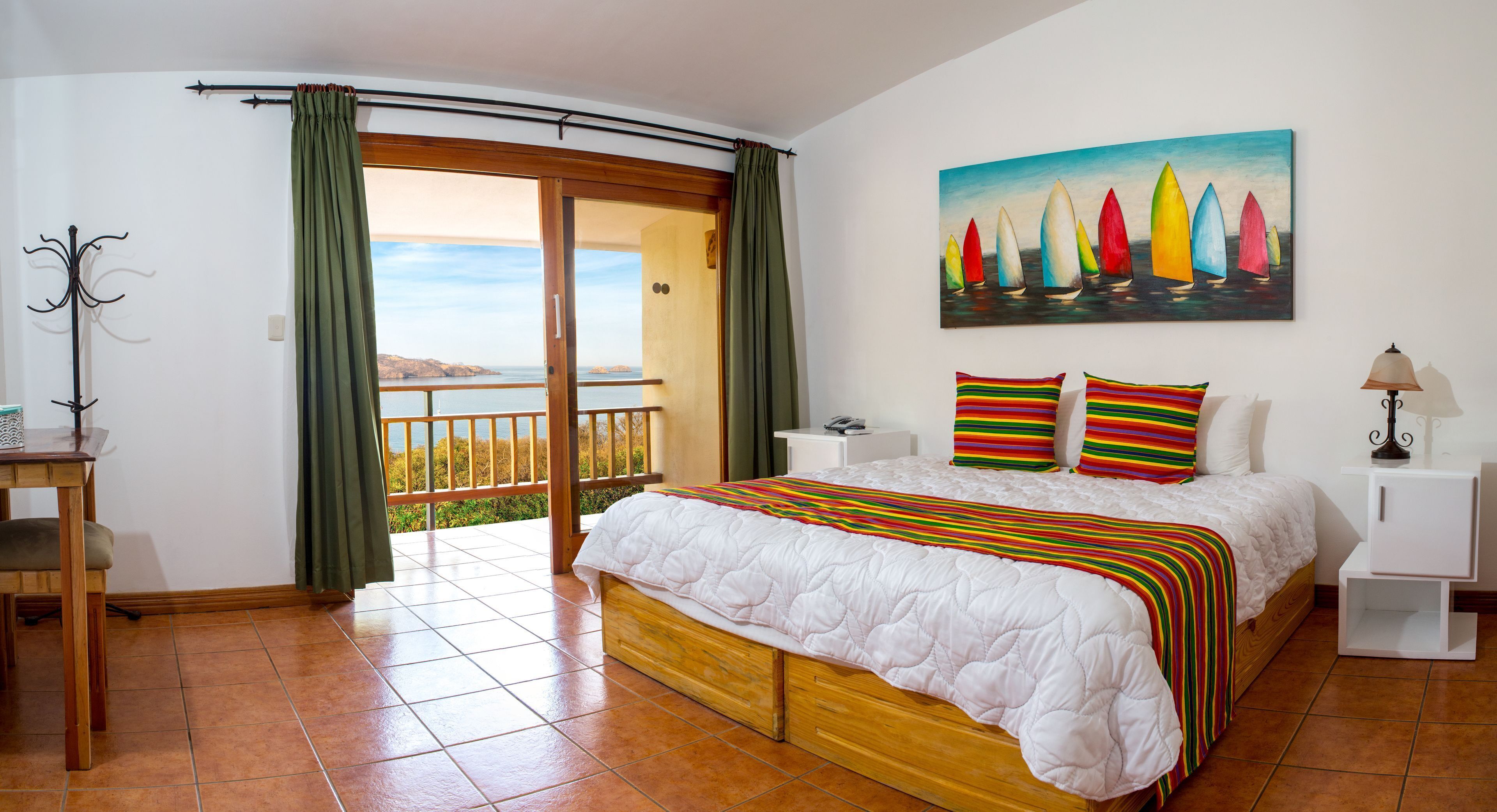 Down duvets, pillow-top beds, in-room safe, blackout curtains