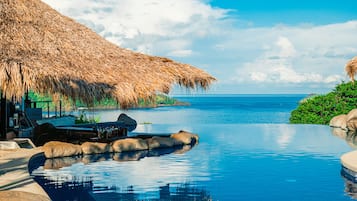 4 albercas al aire libre, camas balinesas gratuitas y camastros