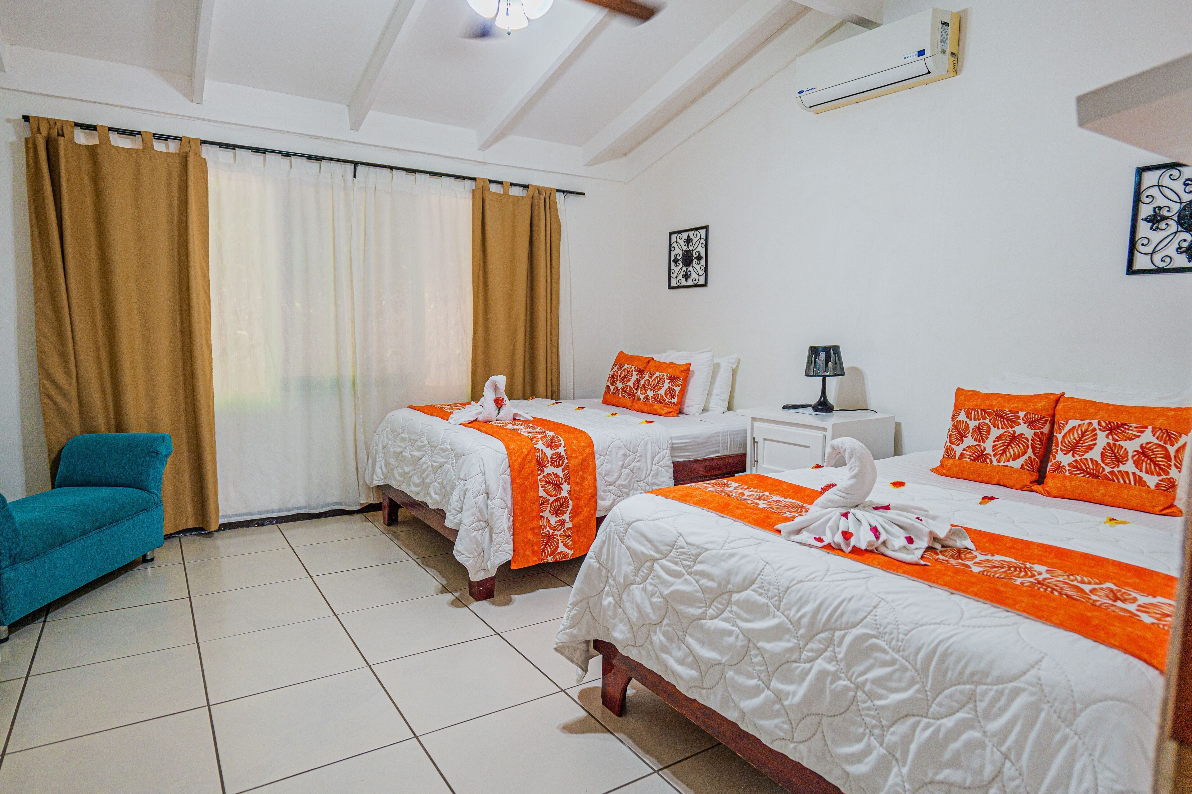 Down duvets, pillow-top beds, in-room safe, blackout curtains