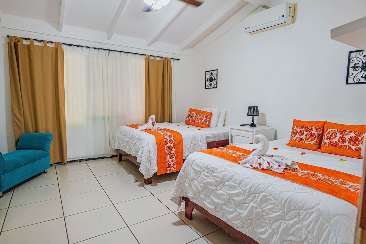 Down duvets, pillow-top beds, in-room safe, blackout curtains