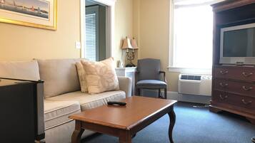 Premier Suite, 2 Double Beds, Private Bathroom, Corner | Living room | TV