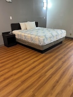 Deluxe Room, 1 King Bed, Smoking, Refrigerator & Microwave | Free WiFi, bed sheets