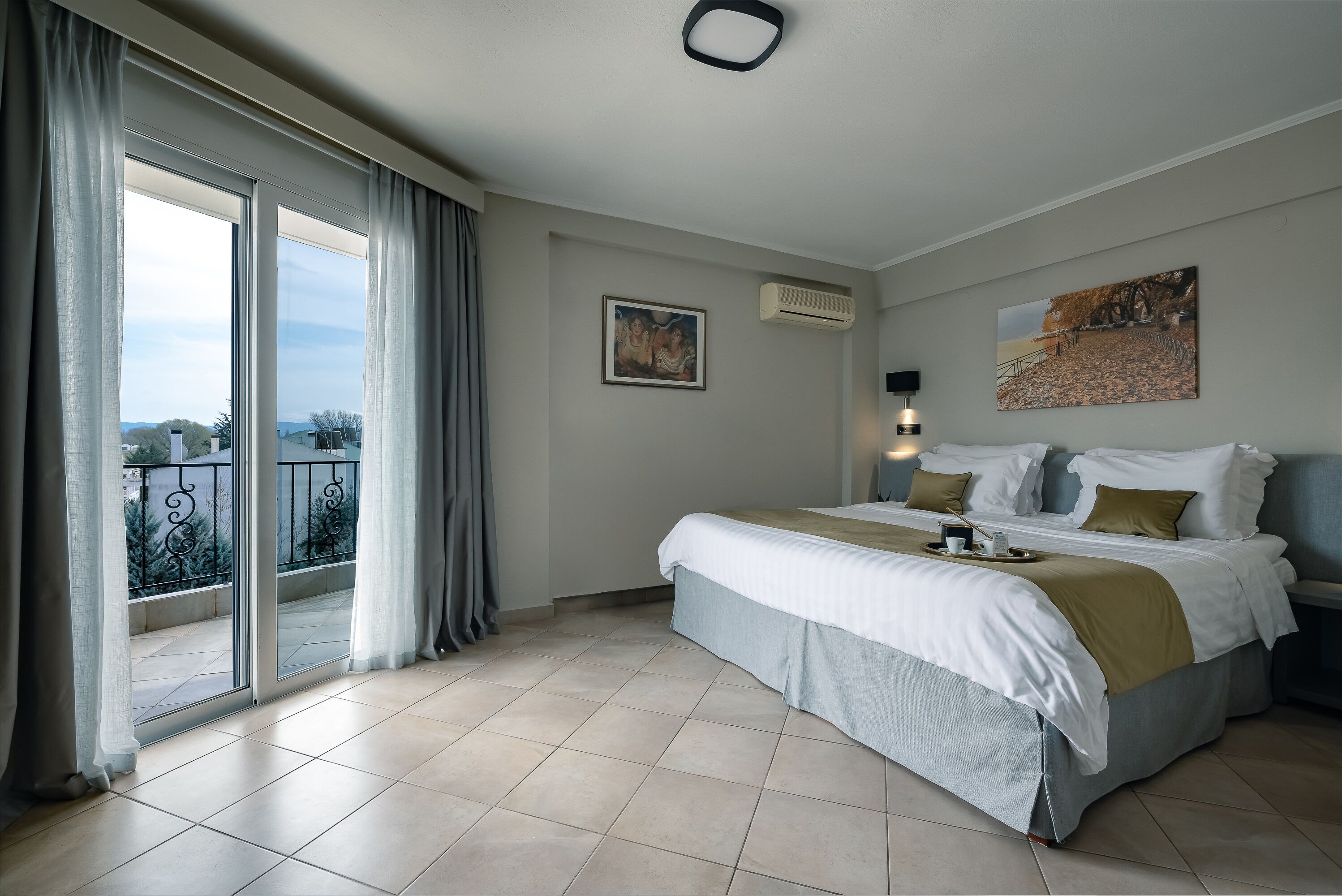 standard room, partial lake view | 1 bedroom, in-room safe, soundproofing, iron/ironing board