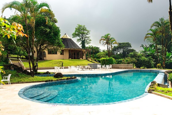 Outdoor pool, open 7:00 AM to 8:00 PM, pool umbrellas, sun loungers - Royal Palm Galapagos, Curio Collection Hotel by Hilton (Santa Rosa)