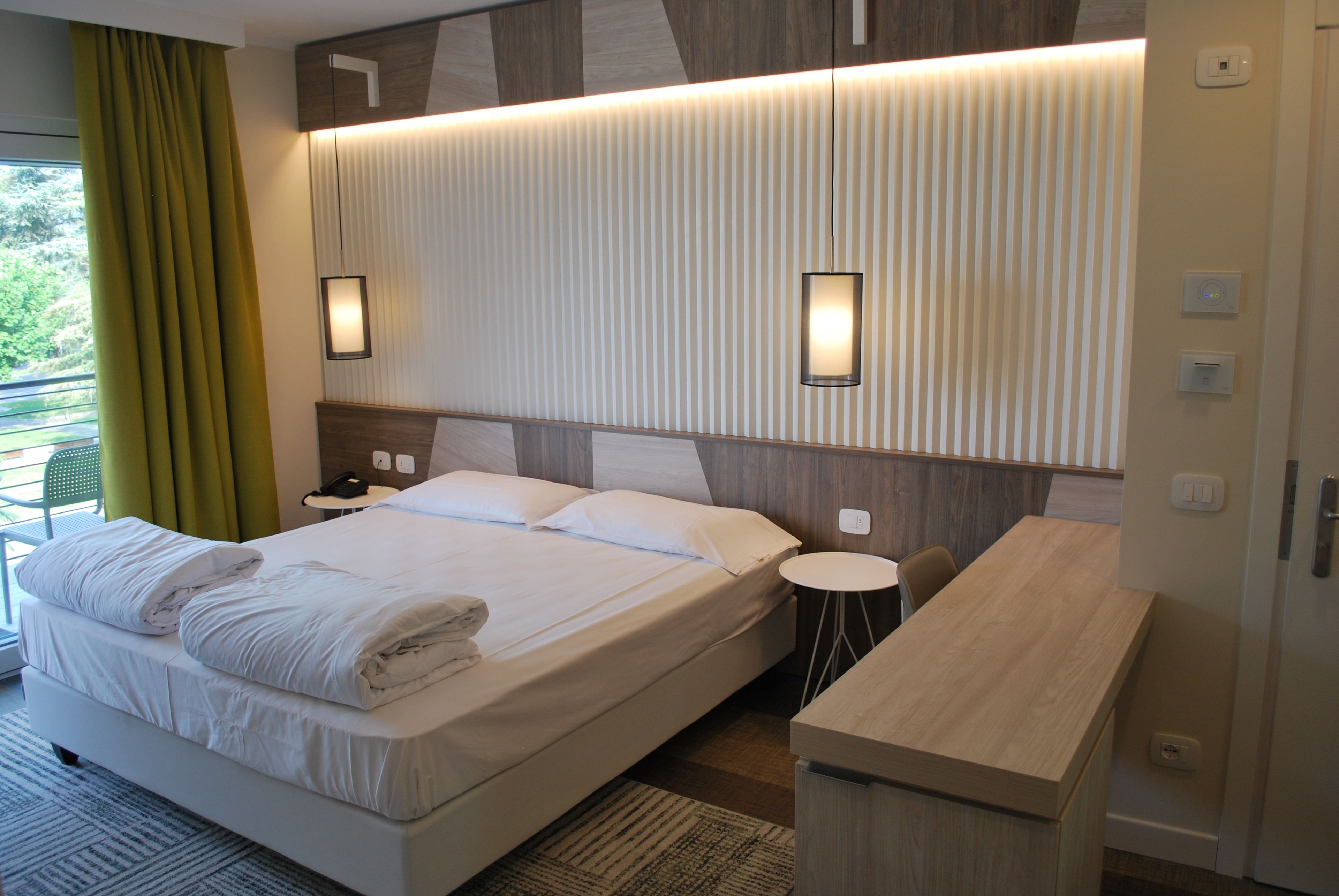 junior studio suite, balcony, lakeside | 1 bedroom, in-room safe, desk, blackout curtains