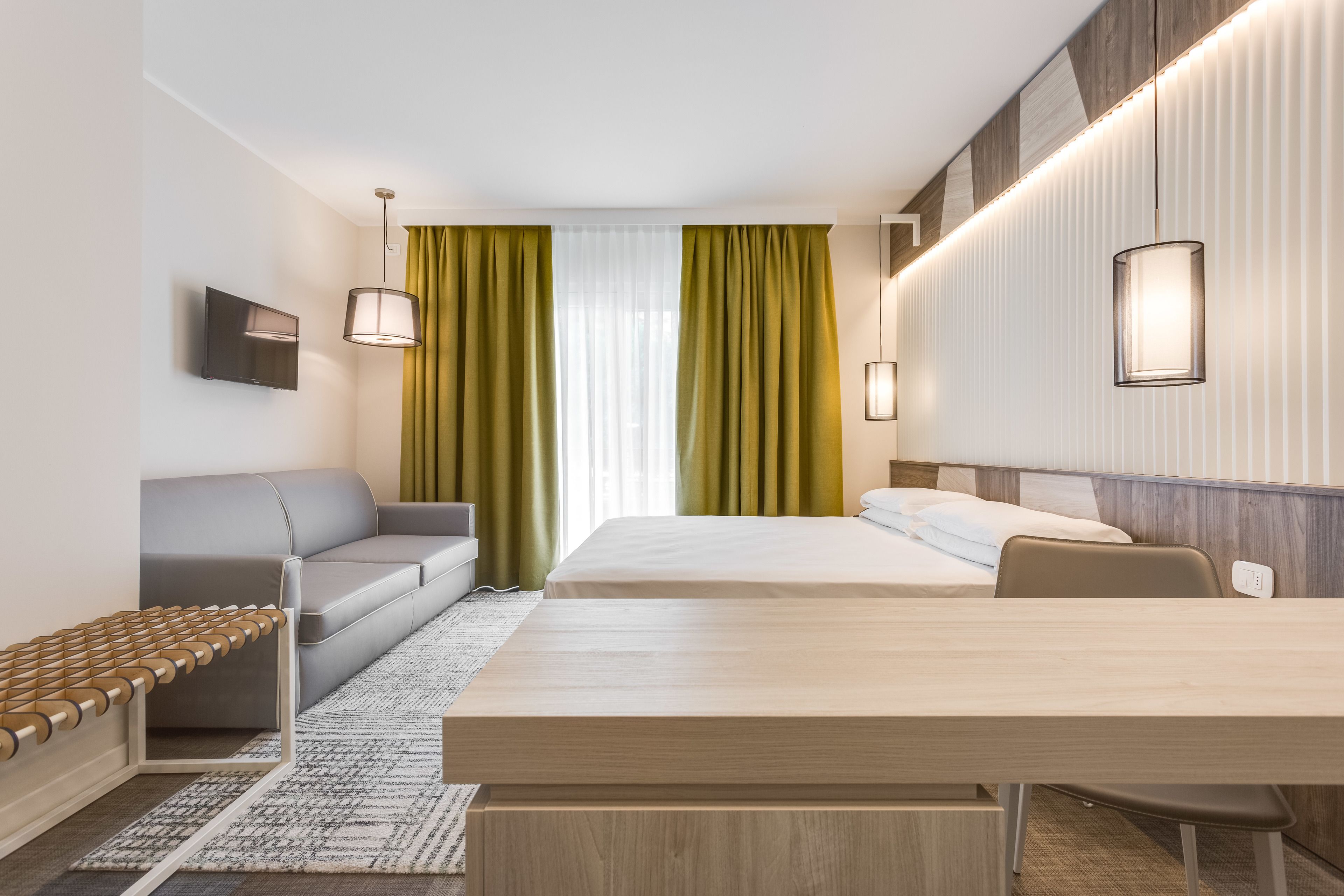 junior studio suite, balcony, lakeside | 1 bedroom, in-room safe, desk, blackout curtains