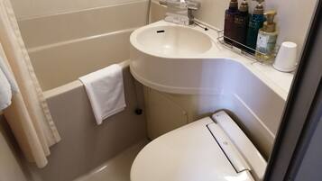 Combined shower/tub, deep soaking tub, free toiletries, hair dryer
