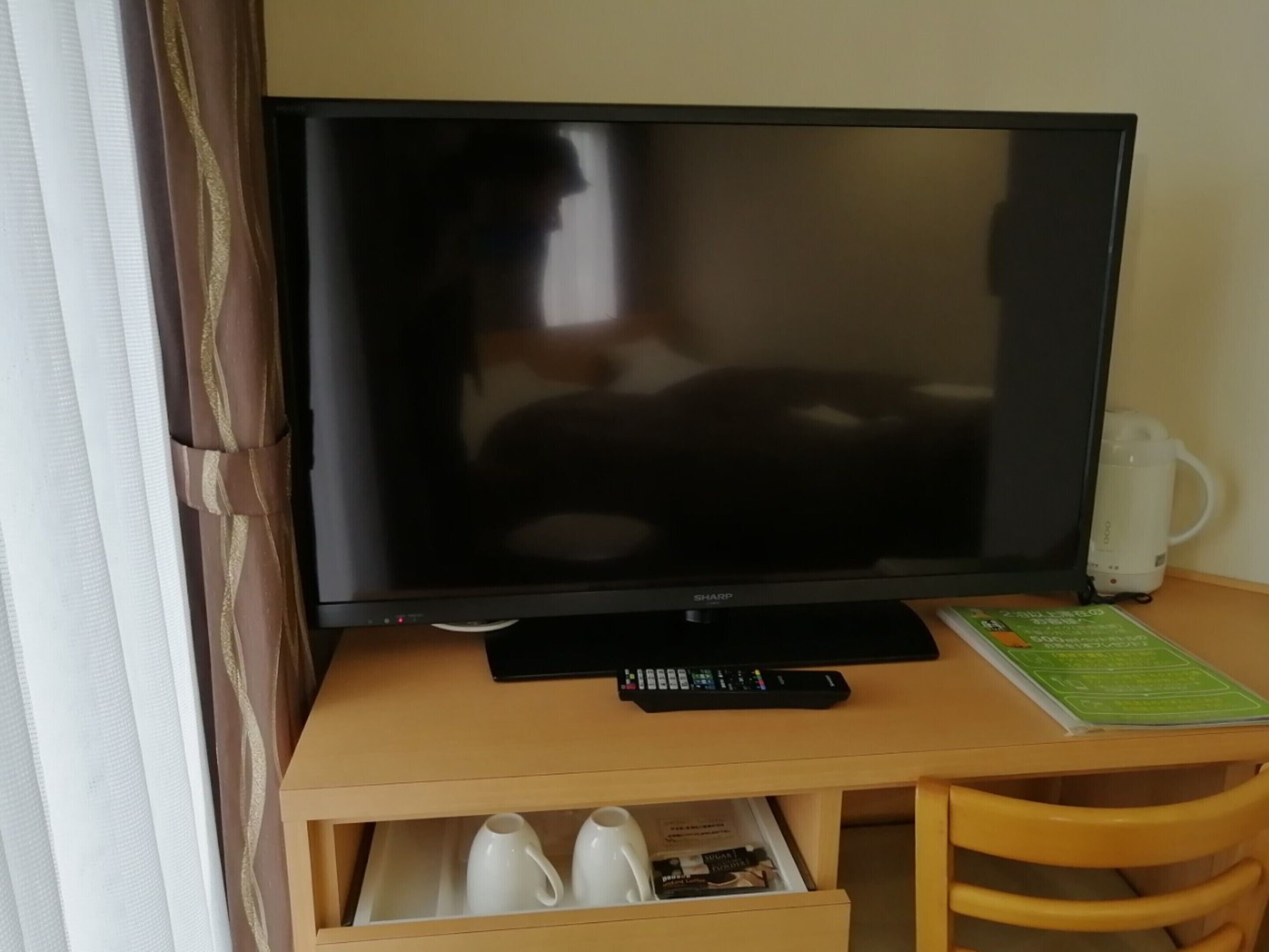 desk, blackout curtains, free wifi, bed sheets