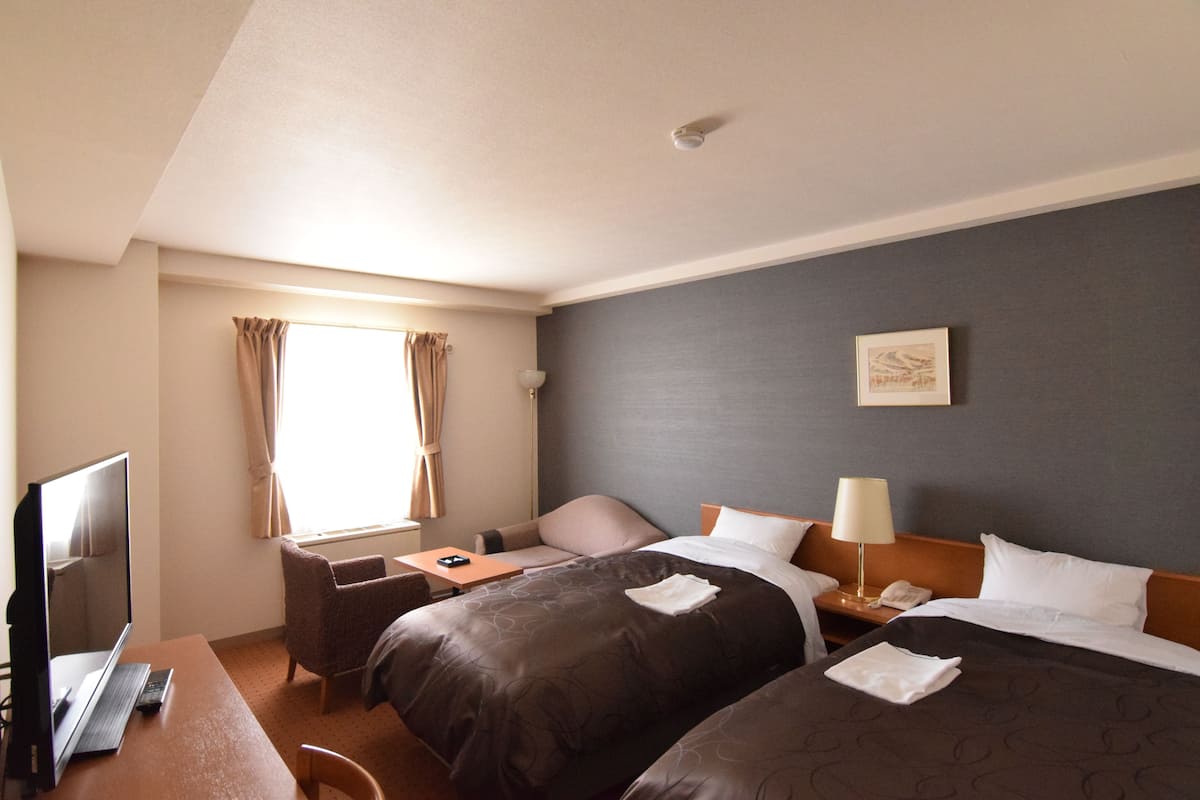 desk, blackout curtains, free wifi, bed sheets