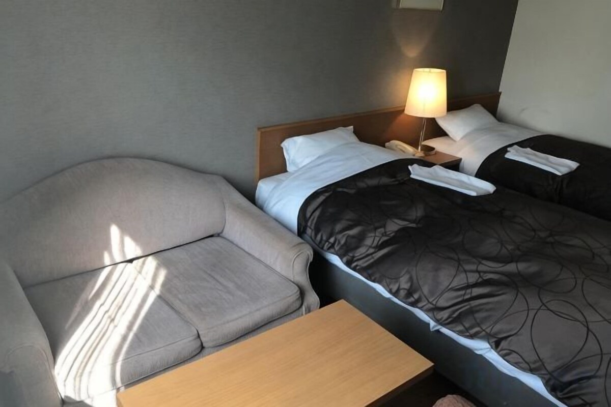 Desk, blackout drapes, WiFi (free), bed sheets