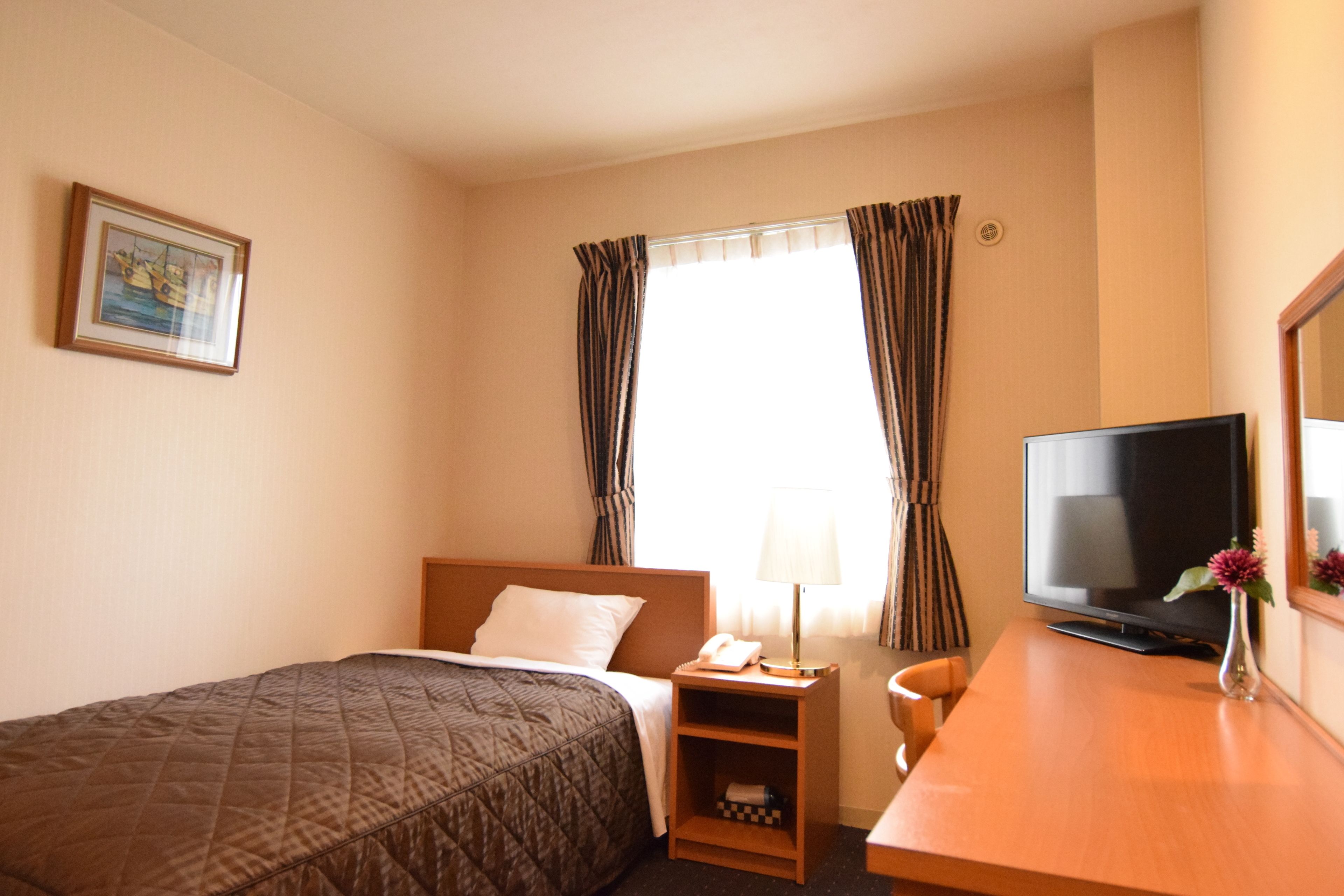 single room, smoking (1 single bed) | desk, blackout curtains, free wifi, bed sheets