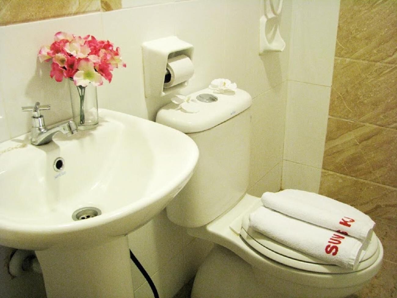 shower, slippers, bidet, towels