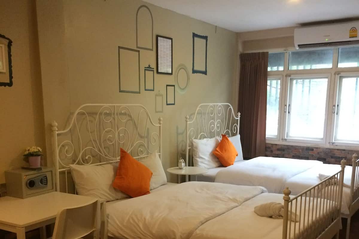 Deluxe Room, 2 Queen Beds | In-room safe, WiFi (free), bed sheets