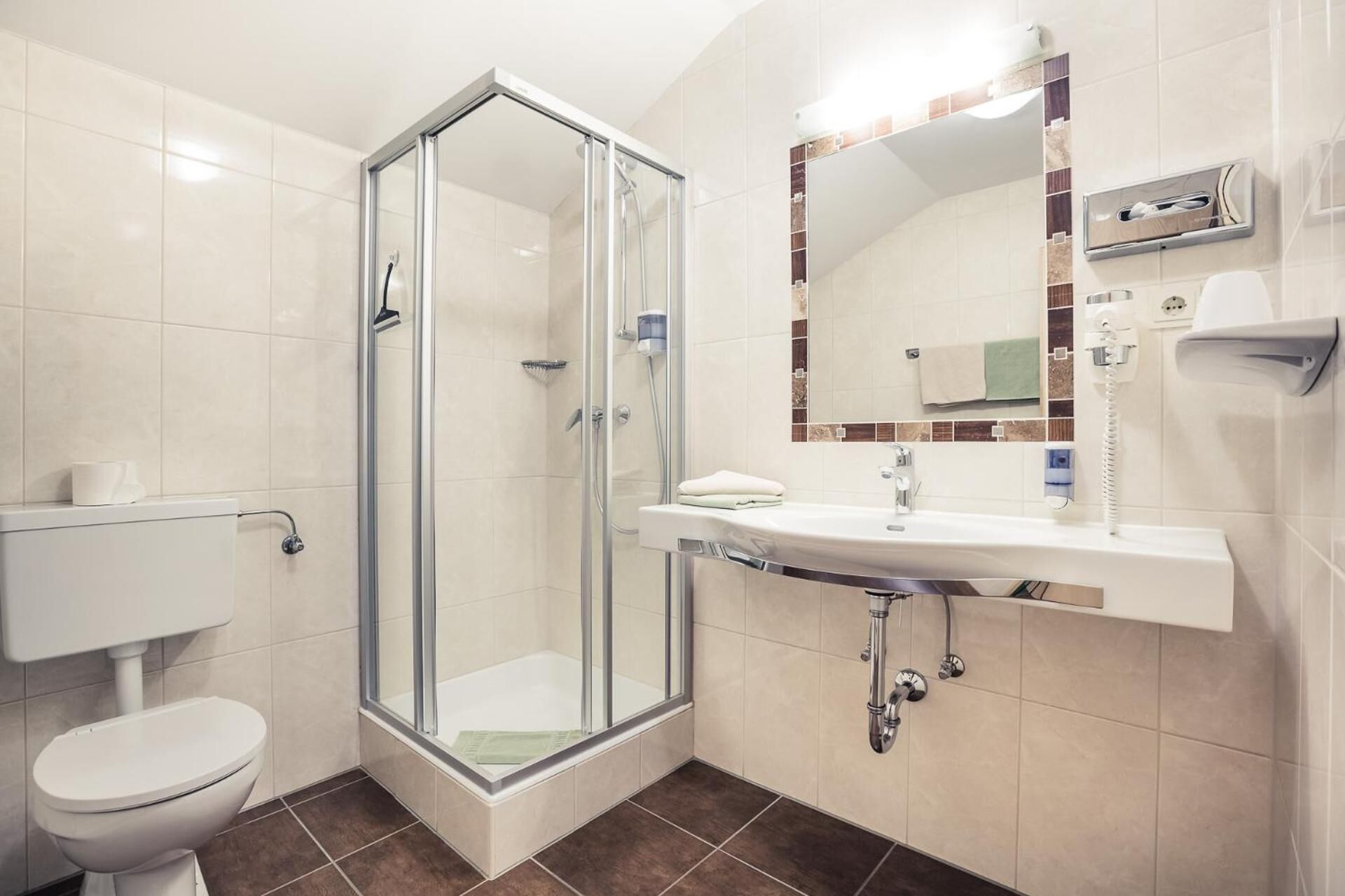 hair dryer, towels, soap, shampoo