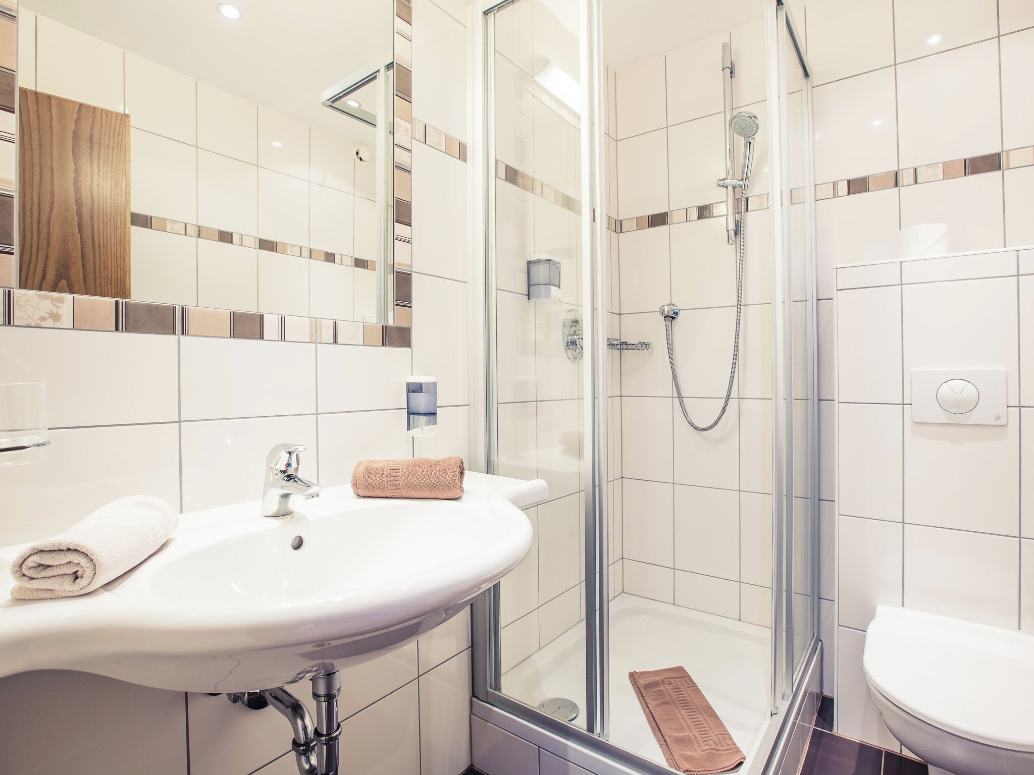 economy double room | bathroom | hair dryer, towels, soap, shampoo