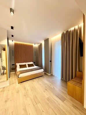 Deluxe-Zimmer | 1 Schlafzimmer, Daunenbettdecken, Minibar, individuell dekoriert