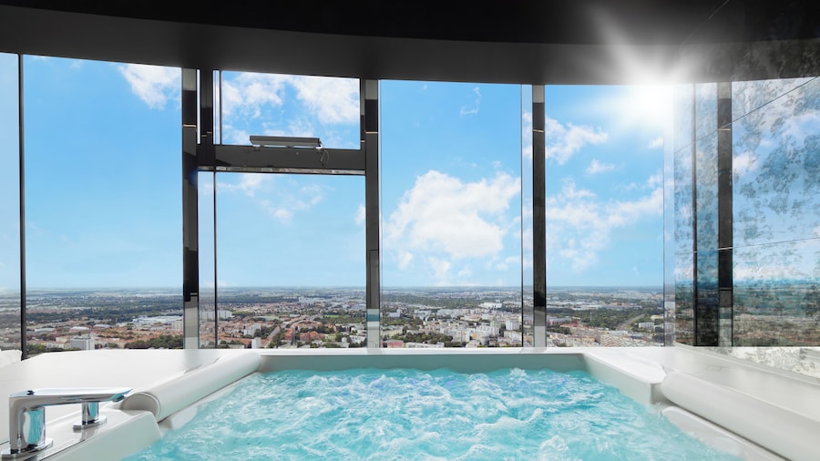 Apartments in Sky Tower with Bathtub near the window