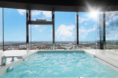 Apartments in Sky Tower with Bathtub near the window