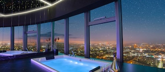 Apartments in Sky Tower with Bathtub near the window