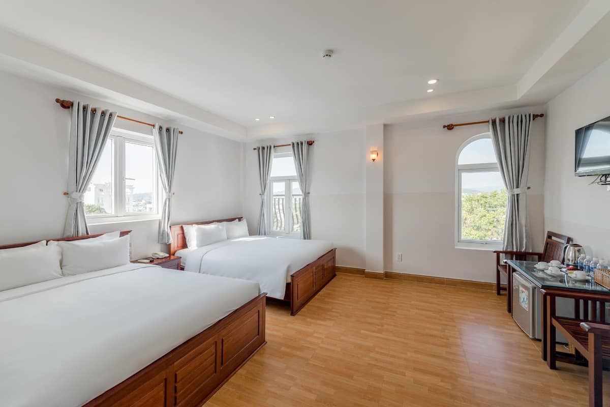 Family Room | Premium bedding, minibar, in-room safe, desk