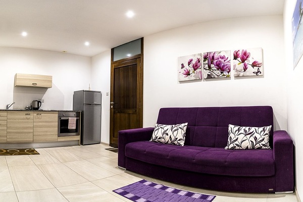 Apartamento, sacada | Área de estar | TV de tela plana 32 polegadas com canais digitais, TV