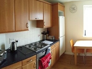 Full-sized fridge, microwave, stovetop