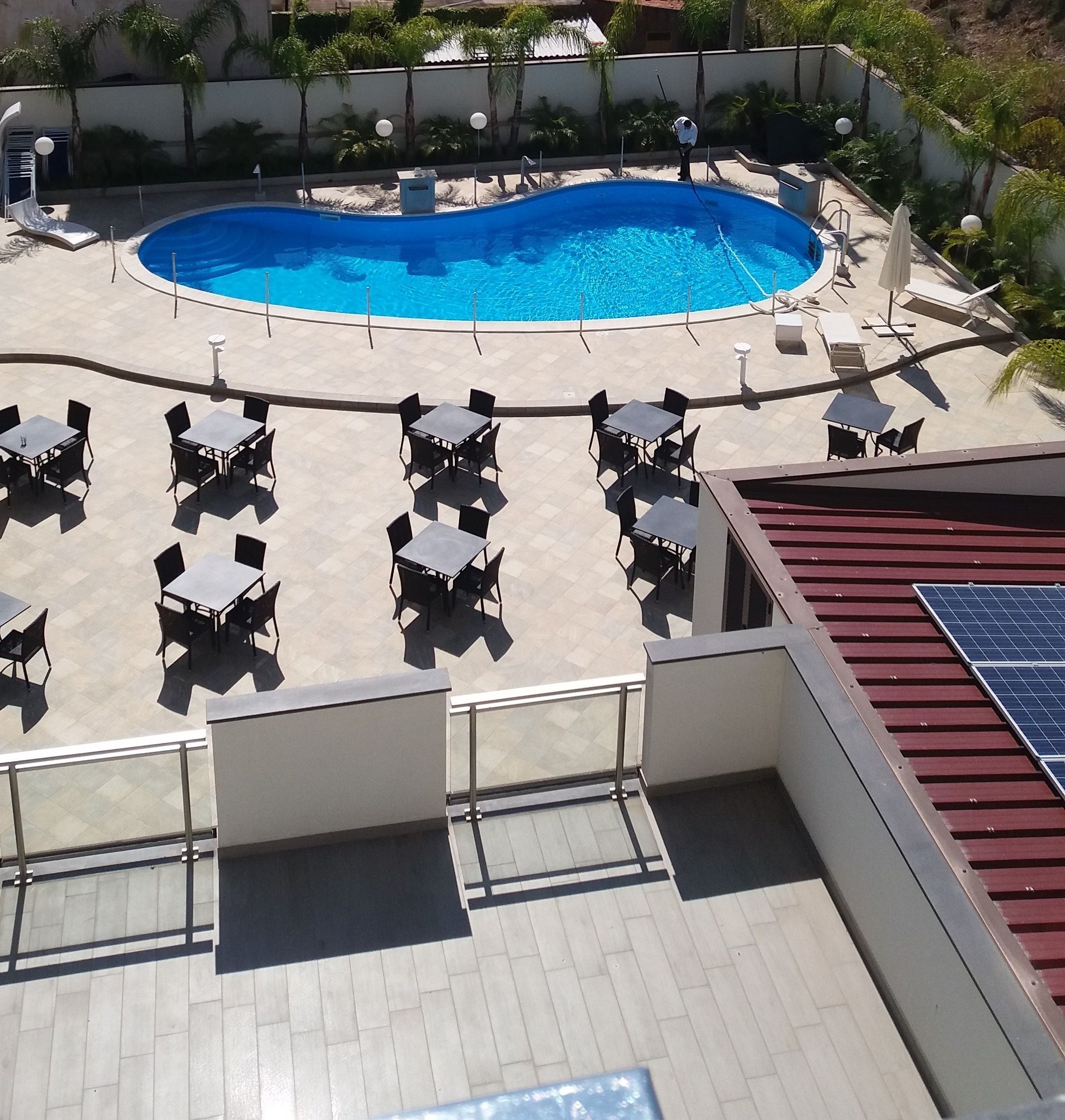 outdoor pool, open 9:00 am to 7:00 pm, pool umbrellas, pool loungers
