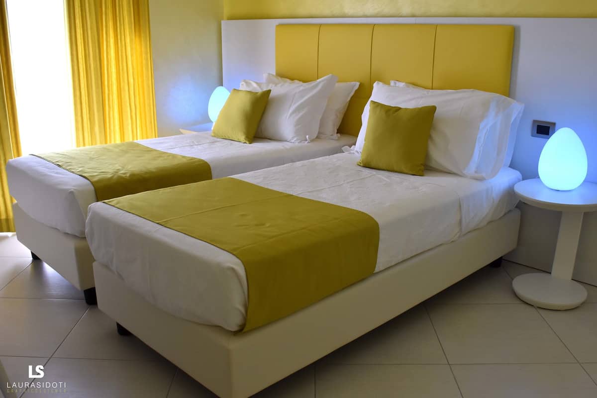 Ropa de cama de alta calidad, edredón y minibar