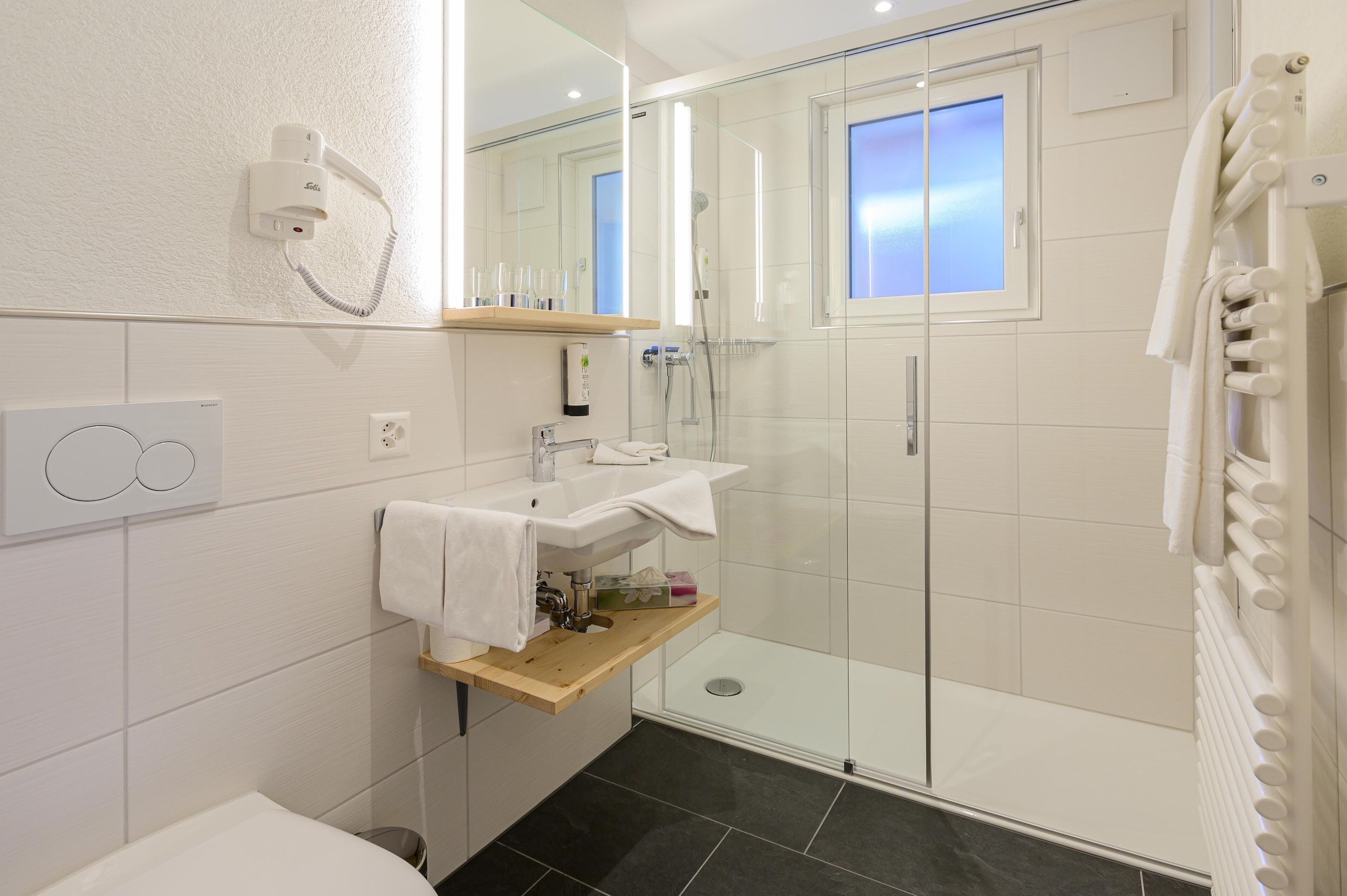 superior double room | bathroom | free toiletries, hair dryer, slippers, towels
