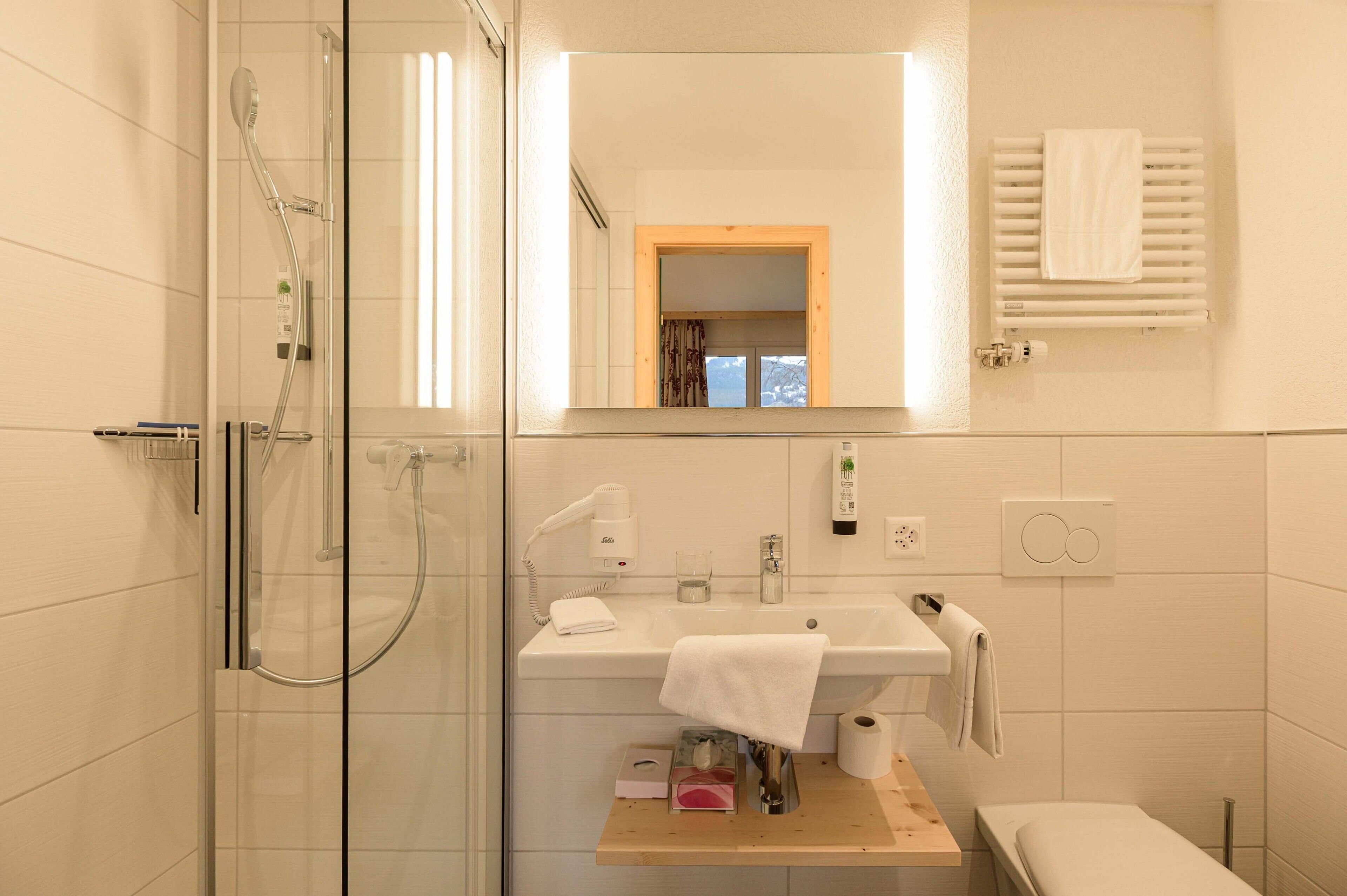 comfort single room | bathroom | free toiletries, hair dryer, slippers, towels