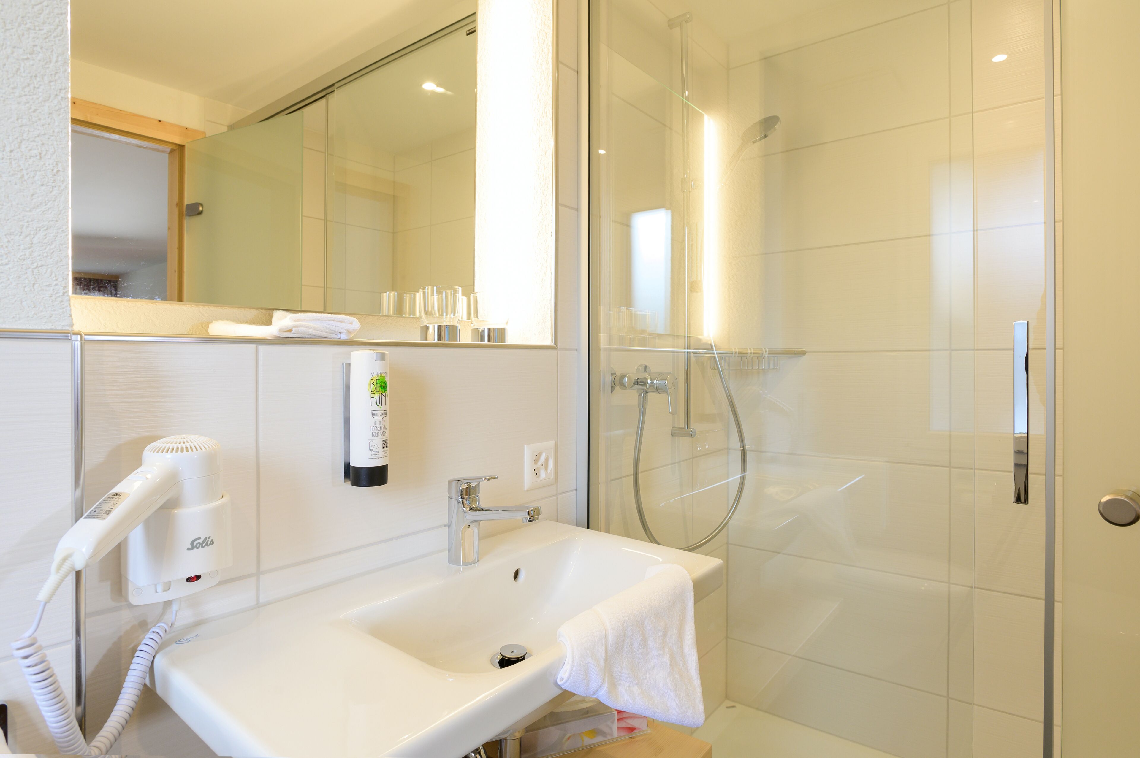 superior double room, eiger view | bathroom | free toiletries, hair dryer, slippers, towels