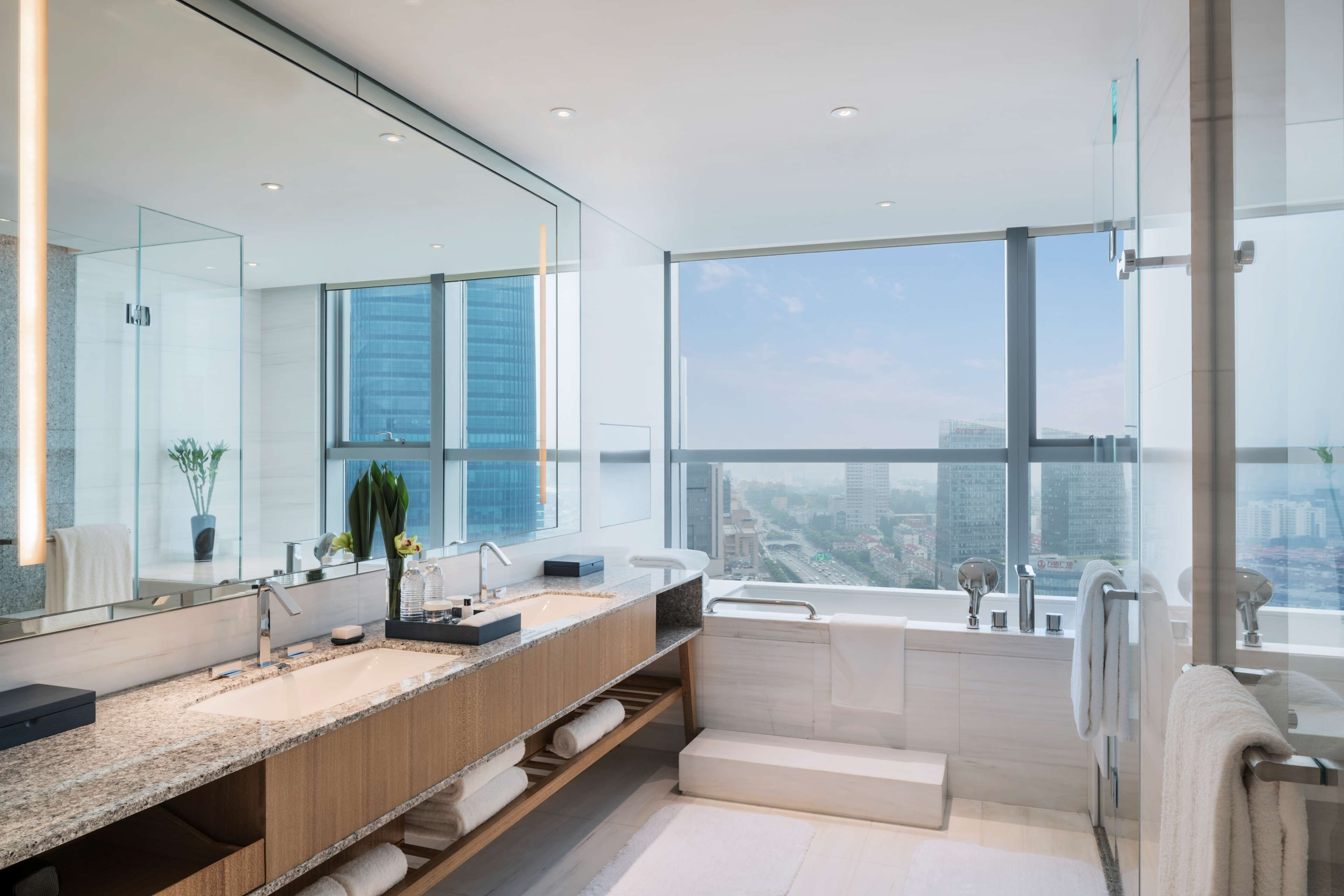 hair dryer, bathrobes, slippers, towels