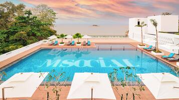 Outdoor pool, open 8:00 AM to 8:00 PM, pool umbrellas, sun loungers